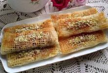 بهترین رسپی طرز تهیه شیرینی رشته خوشکار خانگی؛ شیرینی اصیل گیلانی با مغز گردویی خوشمزه