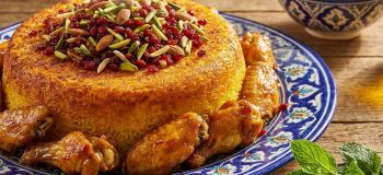 شاهکار آشپزی ایرانی: دستورپخت ته چین بال مرغ مجلسی و طلایی