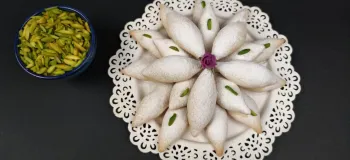 طرز تهیه شیرینی ساق عروس فوق العاده خوشمزه و ترد شیرینی نوستالژی عید رو خاص و متفاوت درست کن!