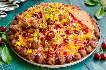 طرز تهیه آلبالو پلو با گوشت قلقلی؛ یک تجربه اصیل ایرانی