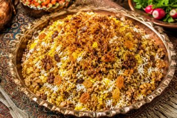 پتله پلو همدانی؛ غذای سنتی و مقوی با عطر گندم، کشمش و گردو | روش اراکی ها