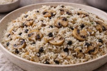 طرز تهیه قارچ پلو با انواع گوشت؛ خوش عطر، مجلسی و ساده در خانه