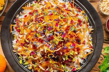 رمز و راز طرز تهیه شیرین پلو شیرازی؛ شکرپلوی اصیل با عطر زعفران و خلال نارنگی