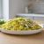 طرز تهیه باقالی پلو با مرغ ریش ریش؛ یک پلوی اصیل و مجلسی