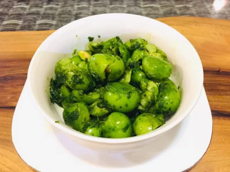 طرز تهیه هلی کتنی (گوجه سبز کوبیده) دسر خاص شمالی