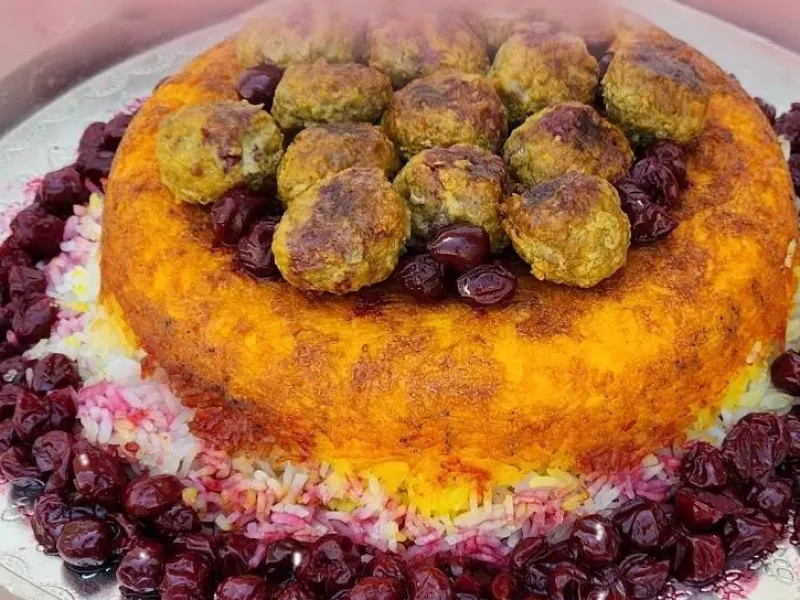 طرز تهیه ته چین آلبالوپلو غذای مجلسی و سنتی ایرانی